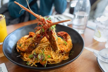 Foto op Canvas tomato pasta with lobster ロブスターを使ったトマトパスタ © fukayu04