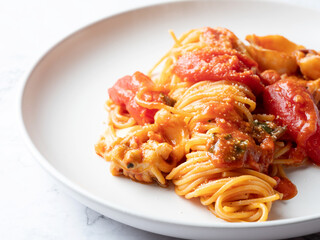 Tomato and cuttlefish pasta on a plate