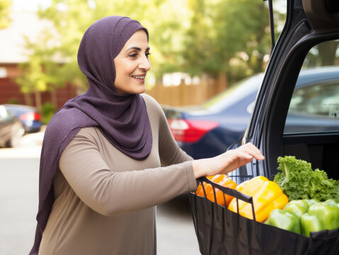 a person unloading groceries 