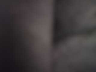 Abstract blurred background image of black color gradient used as an illustration. Designing posters or advertisements.