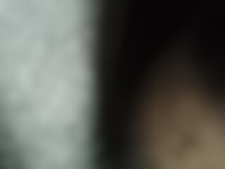 Abstract blurred background image of black color gradient used as an illustration. Designing posters or advertisements.