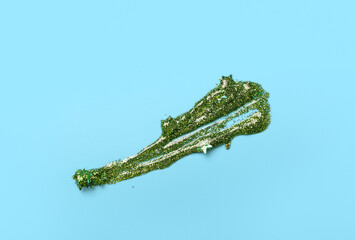 Glitter stroke on blue background