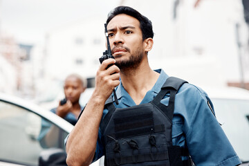 Asian man, police and walkie talkie for backup in city communication, reinforcement or emergency. African female person, security guard or cop radio calling team for crime in street of an urban town