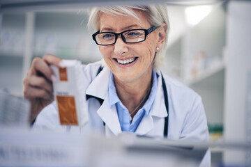 Happy woman, pharmacist and reading medication on shelf for inventory, diagnosis or prescription at pharmacy. Mature female person, medical or healthcare professional checking medicine in drugstore - obrazy, fototapety, plakaty