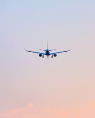 An airplane jet flying overhead on its approach to arrive at an airport. Pearson International Airport Toronto Canada 