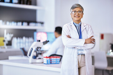 Fototapeta na wymiar Portrait, research and senior woman with arms crossed, medical and success with lab equipment, smile and development. Female person, confident and healthcare professional with science and innovation