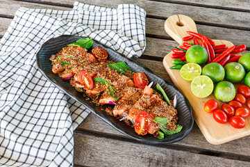 Thai Food Salmon Larb (Larb is a spicy food and a sour taste. It is a famous food for Thai people in the Northeast)