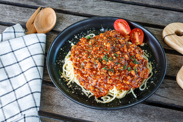 Traditional italian spaghetti bolognese on a plate. Bolognese sauce is classic italian cuisine dish. Popular italian food.
