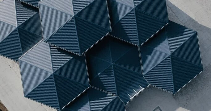 Blue hexagon roof structures aerial