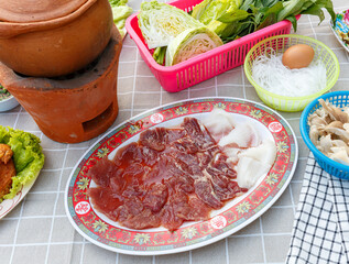 Chim chum. It is the Northeastern food of Thailand.