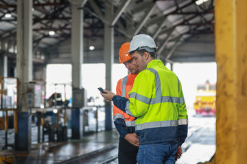 Obraz premium Locomotive Engineers trading Carbon Credits on platform for Responsible Railway Emission Reduction