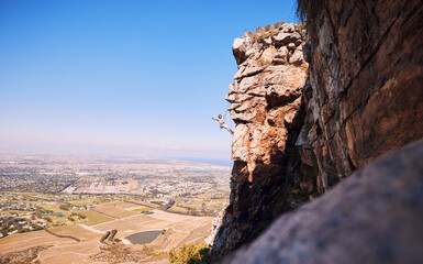 Sports, rock climbing and space with man on mountain for fitness, adventure and challenge. Fearless, workout and hiking with person on training cliff for travel, freedom and exercise mockup