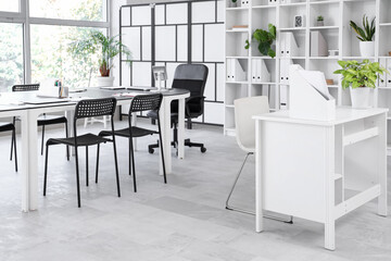Interior of conference hall with tables in office