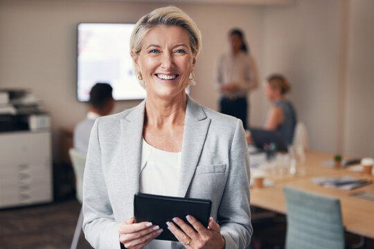 Business, portrait of mature woman with tablet and happy team leader, ceo in office with success. Leadership, smile and corporate employee, senior businesswoman boss in management at digital startup.