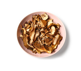 Pink bowl with tasty dried mushrooms on white background
