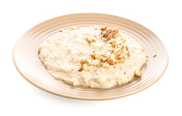 Plate of tasty baba ghanoush on white background