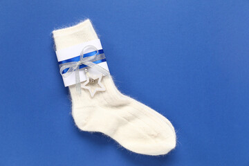 Warm socks on blue background