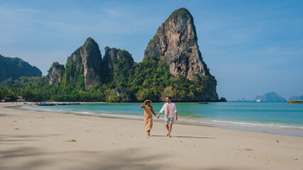 Railay beach Krabi Thailand, tropical beach of Railay Krabi, couple men and woman on the beach