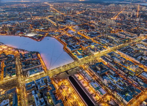 Embankment of the central pond and Plotinka in Yekaterinburg at winter sunset. The historic center of the city of Yekaterinburg, Russia, Aerial View