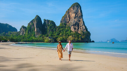 Railay beach Krabi Thailand, tropical beach of Railay Krabi, couple men and woman on the beach