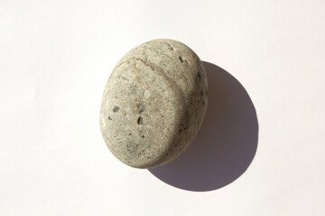 Natural pebbles on white background