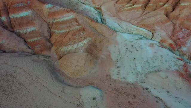 Altyn Emel National Park in Kazakhstan. a Beautiful layered flaky and variegated desert mountains of Aktau