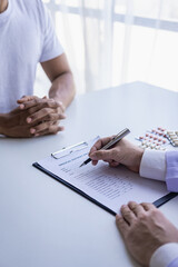 Doctor consulting patient sitting in doctor's office. Diagnosis. Disease prevention. health care...