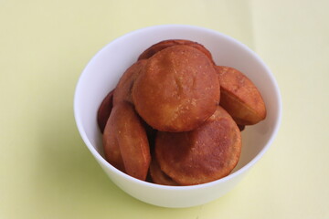 Mangalore Bun or Banana Poori, Sweet Banana buns, deep fried bread with whole wheat flour and mashed bananas, South Indian food