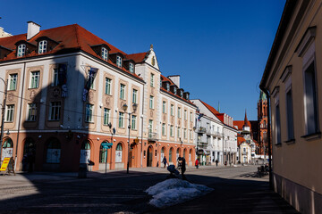 A beautiful square with historical buildings on a sunny day. Kosciuszko Market Square in Bialystok, Poland, March 3, 2021
