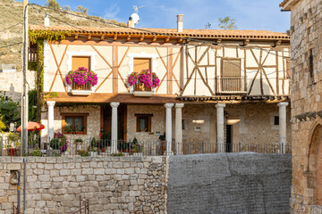 Curiel de Duero, Spain - October 12, 2023: Views of the historic buildings, some from medieval times, of the town of Curiel de Duero, Spain - obrazy, fototapety, plakaty