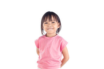 Cute little girls standing and shy smile isolated on white background with clipping path.