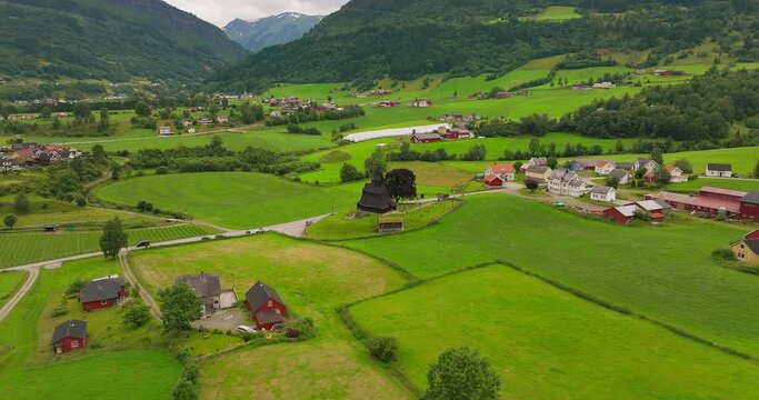 Hopperstad Stave Church in lush countryside, Vikoyri, Vik, Norway. Aerial