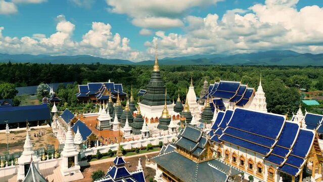 4K Cinematic nature aerial drone footage of the beautiful temple of Wat Ban Den next to Chiang Mai, Thailand on a sunny day