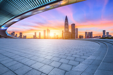 City square and skyline with modern buildings in Shenzhen at sunset, Guangdong Province, China.