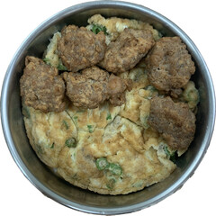 Thai style omelet, egg with long bean mixed, served with brown fried minced pork balls isolated on white background