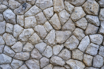 Stone Wall Texture, Natural stone granite wall. Seamless Texture Stone Wall. Texture of old stone brick wall in city, decorative uneven cracked real stone wall surface with cement