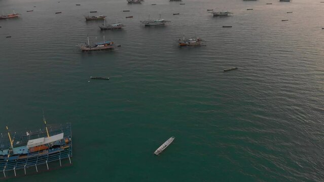 Flying over docked fishing boats at Belitung Indonesia, aerial