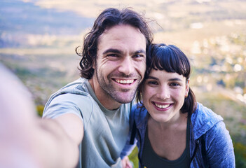 Fototapeta premium Hiking, selfie and portrait of couple in nature for adventure, holiday and journey on mountain. Travel, dating and happy man and woman take picture for social media, trekking and healthy memories
