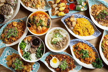 Various Southeast Asian food on the table