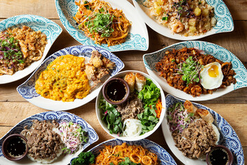 Various Southeast Asian food on the table