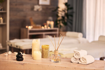 Spa room, candles and hotel background for massage, aromatherapy and self care holiday or vacation....