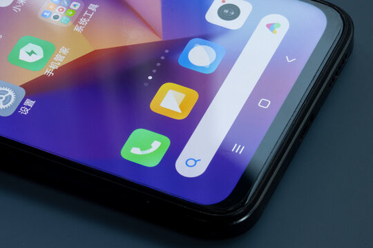 Ningbo, China - Oct 18, 2023: The user interface of a Xiaomi Redmi smartphone. Icon of Xiaomi's voice assistant, Xiao AI (or Mi AI), is seen on the right side of the search bar.