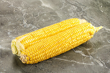 Sweet yellow raw corn cob