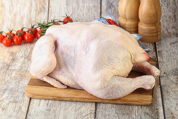 Whole raw chicken for cooking