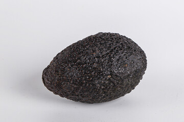 Fototapeta premium Ripe raw whole avocado fruit
