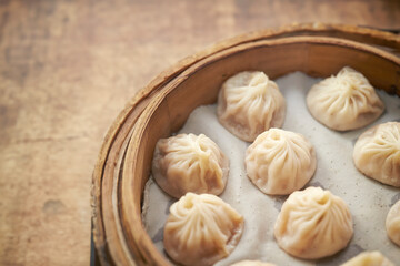 Dumplings in a wooden steamer
