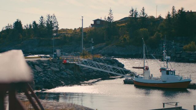 Boat Moored To A Suspended Bridge