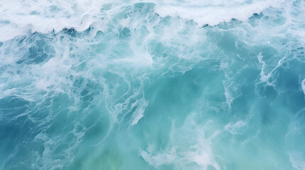 Fototapeta na wymiar surface waves on the beach, Blue sea surface, top view
