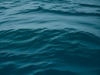 Water surface blue wave macro. Beautiful blue river water photo background with soft waves. Macro blue wave pattern with motion blur.