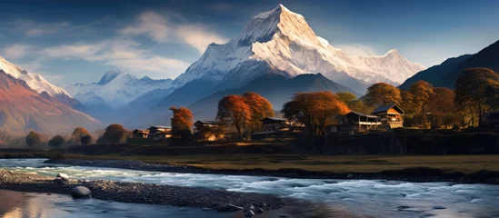 Foto auf Acrylglas Annapurna In the morning you can admire the magnificent views of Annapurna and Machhapuchhre mountains from the village of Tadapani